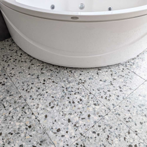 Gemma Fantacy Grey Floor Tile with a bathtub